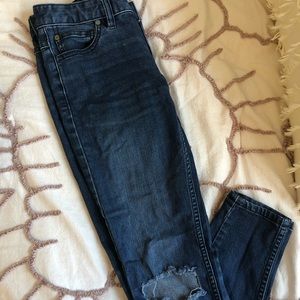 Free People jeans with holes in the knees